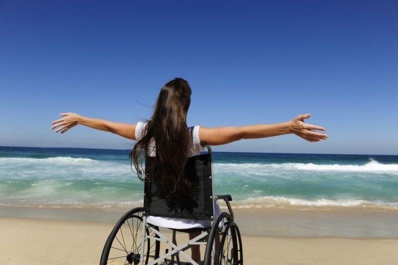 Cadeirante na praia Cadeirante na praia